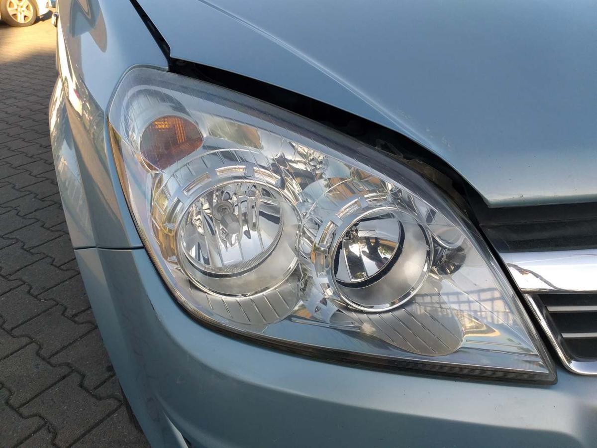 Opel Astra H original Scheinwerfer vorn rechts Halogen Hintergrund Chrom Facelift Bj.2009
